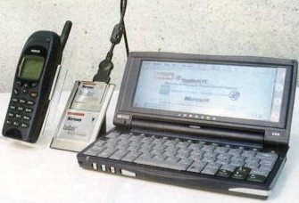 Карманный компьютер Hewlett-Packard Jornada 680 модем Xircom с адаптером и сотовый телефон